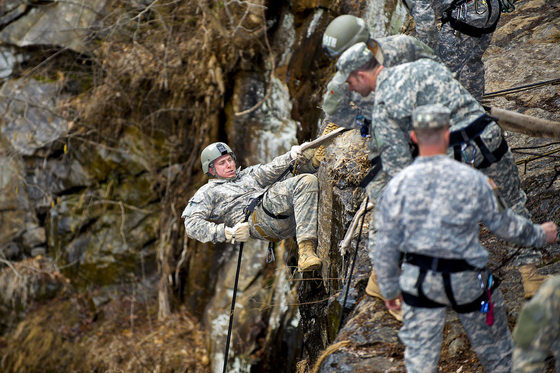 Dahlonega — Defense.gov News Photo 110220-A-7341H-041 - U.S. Army Ranger instructors watch as an Army Ranger student rappels down the side of a 60-foot rock face at Camp Frank D. Merrill in Dahlonega