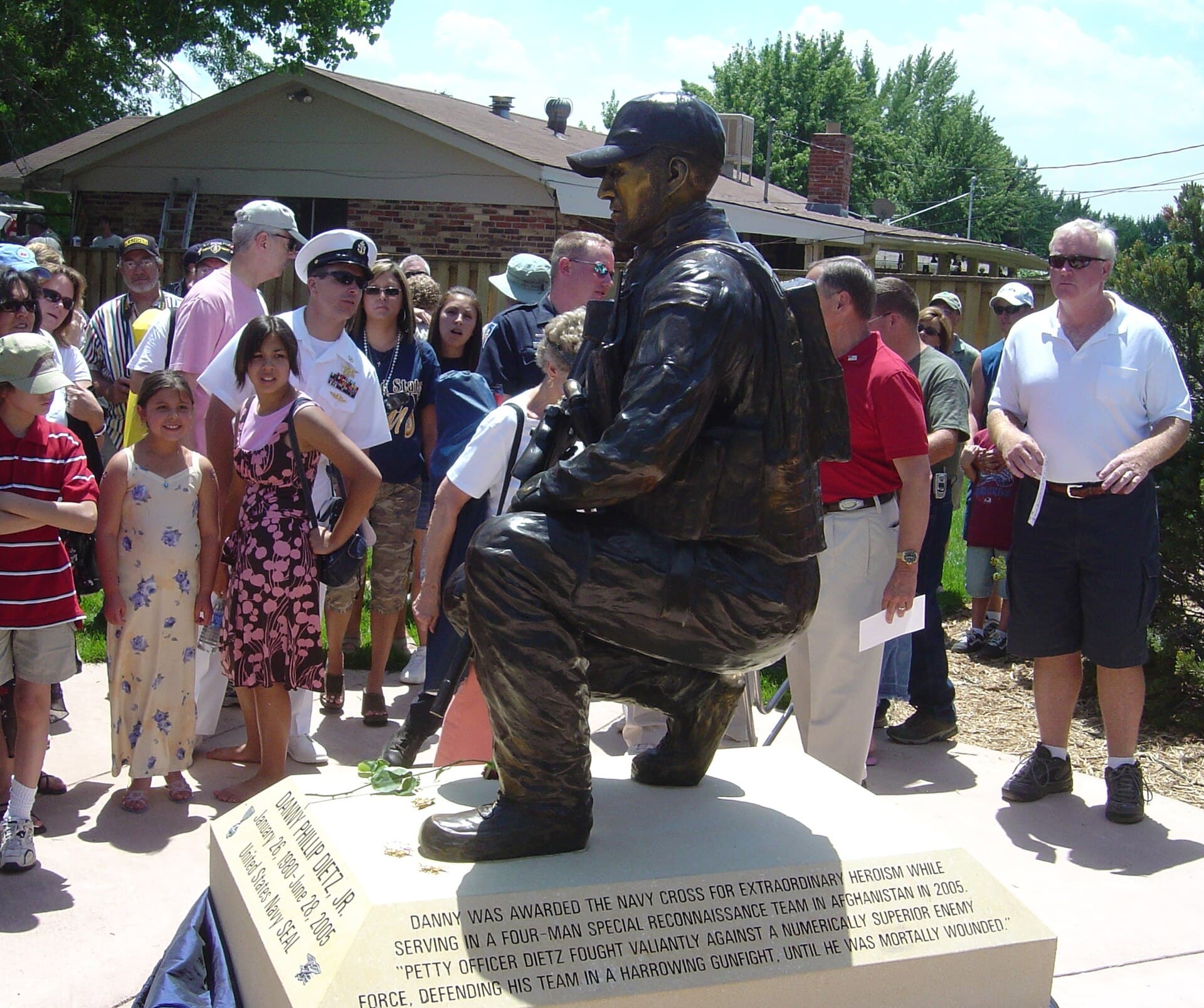 Littleton — US Navy 070704-N-0122P-002 Gunner's Mate 2nd Class (SEAL) Danny P. Dietz was honored by his hometown of Littleton with the dedication of a larger-than-life bronze statue